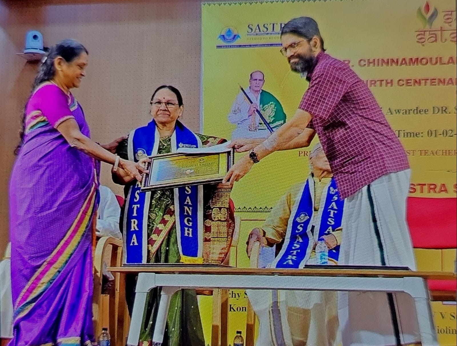 Girija Ramaswamy receiving Sangeetha Vachaspathi award by SASTRA Chennai